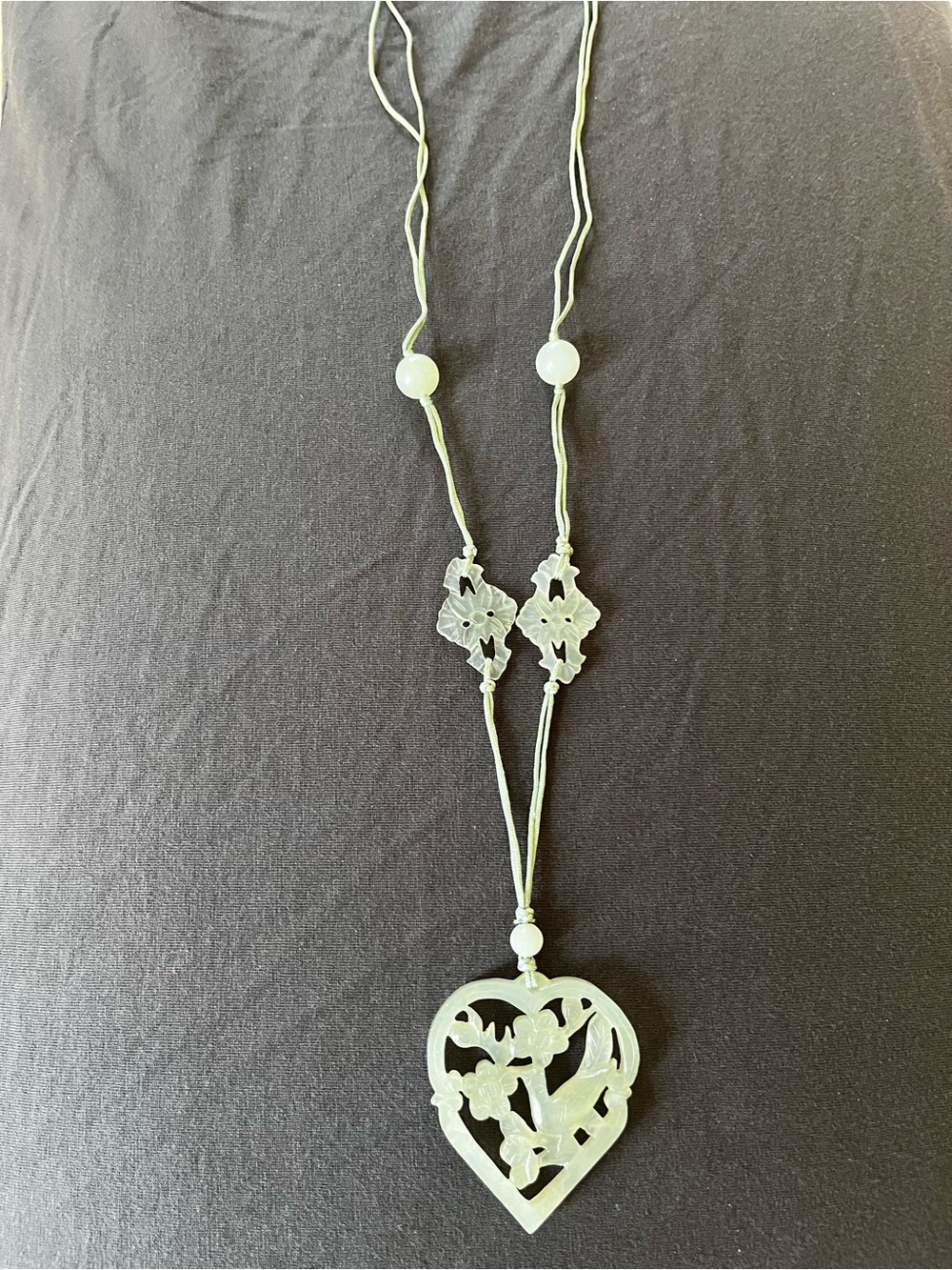 Antique carved jade necklace on 28” silk cord